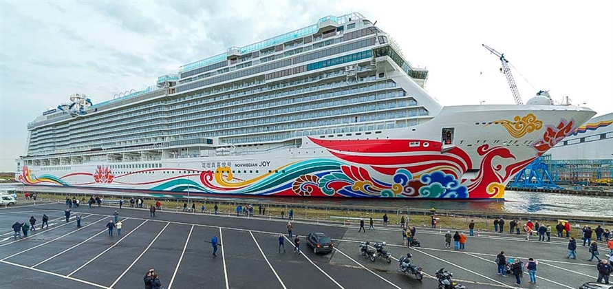 Norwegian Joy floats out from building dock at Meyer Werft