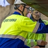 Project managers Saku Jaatinen at Meyer Turku and Janne Auvinen at Royal Caribbean Group, placed coins under the keel for the ceremony (Photo: Royal Caribbean Group)