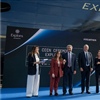 From left, event host Marina Minetti, godmother Camilla Ronco, Fincantieri's Pierroberto Folgiero, Explora Journeys’ Anna Nash and MSC Group’s Pierfrancesco Vago at the coin ceremony for Explora VI (Photo: Explora Journeys)