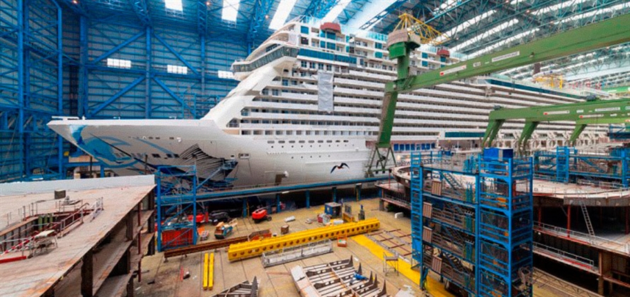 Norwegian Escape floats out of Meyer Werft building dock