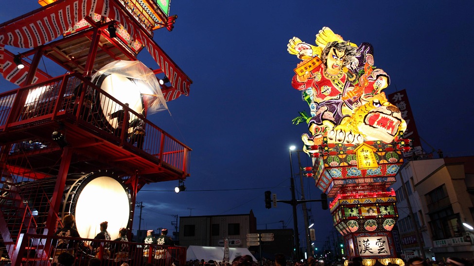 The 23-metre-high Goshogawara Tachineputa neputa depict mythical creatures and samurai warriors and are carried through the streets by hand 