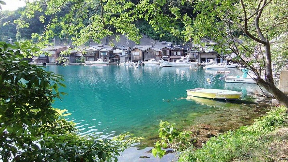 The scenic fishing village in Ine is home to around 230 traditional boat houses, which tourists can see from the shore or during a sightseeing cruise in the bay