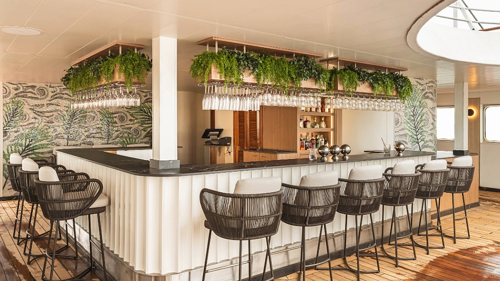 Enhancements in spaces such as the pool bar are designed to make it easier for guests to relax and connect with others (Credit: Windstar Cruises)