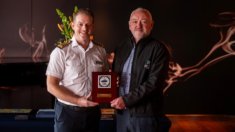 Noel O'Driscoll, captain of Nieuw Stantendam and Bill McCann, operations director and harbour master at Foyle Port commemorated the ship's inaugural call with with a plaque exchange