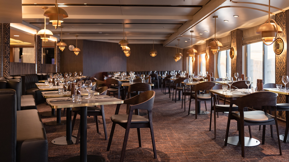 Interiors onboard Hurtigruten’s ship Trollfjord have been designed to reflect Scandinavian aesthetics while recreating the aura of the period of the great exploration expeditions (credit: Hurtigruten/Espen Mills)