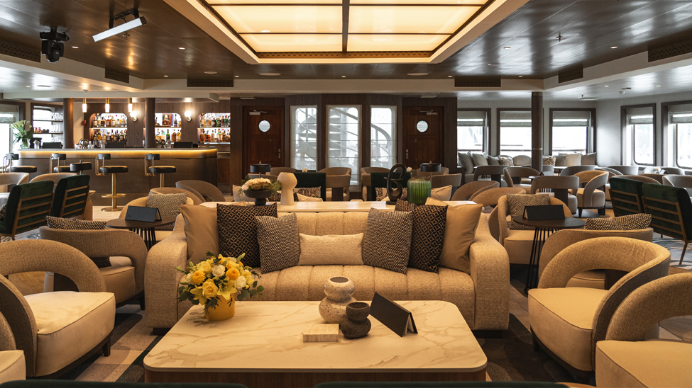 The layout in the lounge has been reconfigured to provide more spaces for guests to sit together (Photo: Windstar Cruises)